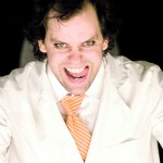 Gay actor Cyle Durkee is a standout delight in the Irish-import musical comedy and knockabout word-play farce, ‘Improbable Frequency.’ (Photo courtesy of Solas Nuna)