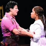Nicholas Rodriguez as Curly and Eleasha Gamble as Laurey in 'Oklahoma!' at Arena Stage's new Mead Center for American Theater. Rodriguez, who's gay, is entirely convincing as a straight character and generates genuine chemistry with Gamble. (Photo by Carol Rosegg; courtesy of Arena.)