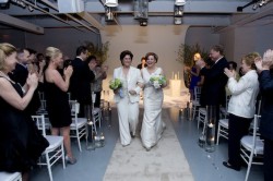Guests applaud Kim Catullo and New York City Council Speaker Christine Quinn immediately after they tied the knot. (Photo by William Alatriste)