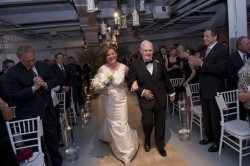 New York City Council Speaker Christine Quinn's father, Lawrence Quinn, escorts her down the aisle. (Photo by William Alatriste)