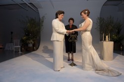 From left: Kim Catullo and New York City Council Speaker Christine Quinn exchange vows in Manhattan on Saturday. (Photo by William Alatriste)