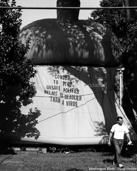 D.C. gay activists covered the home of anti-gay Sen. Jesse Helms in a giant condom on Sept. 5, 1991. Emblazoned on the front was the message: “A condom to stop unsafe politics. Helms is deadlier than a virus.” (Washington Blade photo by Doug Hinckle)