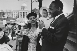 Martin Luther King Jr. with Corretta Scott King and their daughter Yolanda on the steps of the Dexter Avenue Baptist church, gay news, Washington Blade