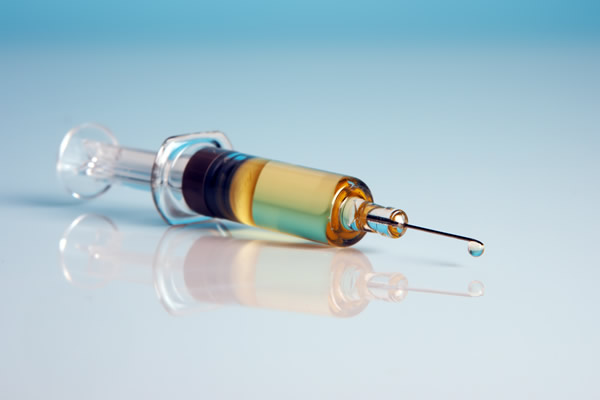 AIDS vaccine, syringe, gay news, Washington Blade