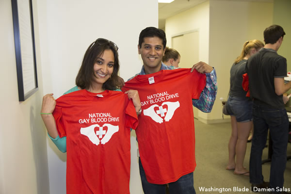 World Bank employee Mridula Mitra of Chevy Chase, Md., left, came to D.C.'s Red Cross blood center on Friday, July 11, to donate blood in place of her gay friend, Sharath Hiremagalore, right, a Virginia resident and graduate student at George Mason University. Both participated in the National Gay Blood Drive protest taking place that day in D.C. and more than 50 other U.S. cities. (Washington Blade photo by Damien Salas)