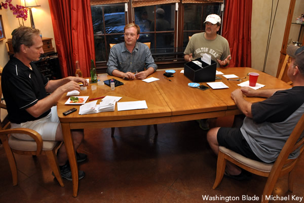 Activists in Jackson, Miss. fill envelopes with 'We Don't Discriminate' literature. (Washington Blade photo by Michael Key)