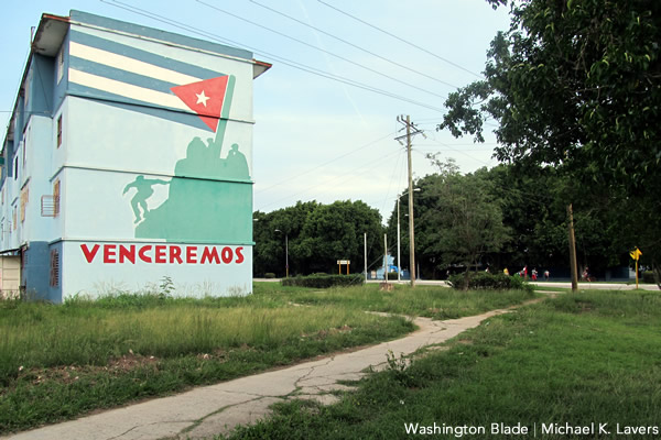 A mural on the side of an apartment building in Ciego de Ávila, Cuba, that reads "we will conquer." (Washington Blade photo by Michael K. Lavers)