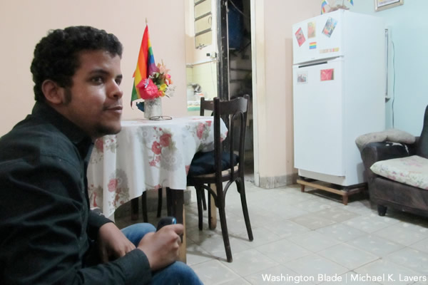 Lázaro Samanaría, a member of Proyecto Shui Tuix, an independent Cuban LGBT rights advocate, sits in Navid Fernández Cabrera's apartment in Havana's 10 de Octubre neighborhood on May 14, 2015. (Washington Blade photo by Michael K. Lavers)