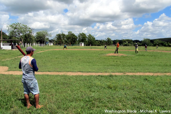 Baseball players along the National Highway near Camagüey, Cuba, on May 17, 2015. (Washington Blade photo by Michael K. Lavers)
