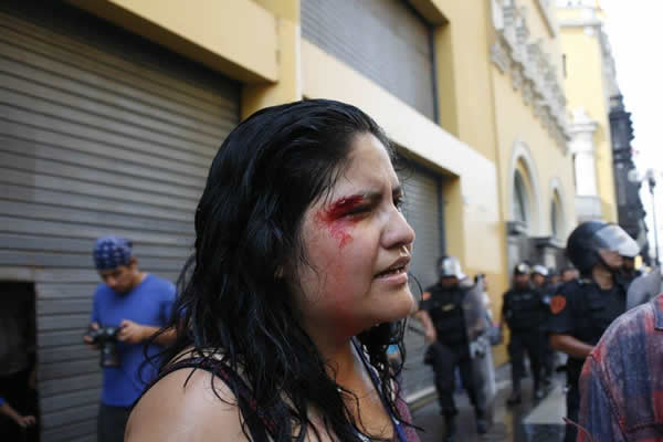 Police in Lima, Peru, on Feb. 13, used water canons against LGBT rights advocates who were protesting in the Peruvian capital's main square. (Photos courtesy of Renzo Salazar/Sin Etiquetas)