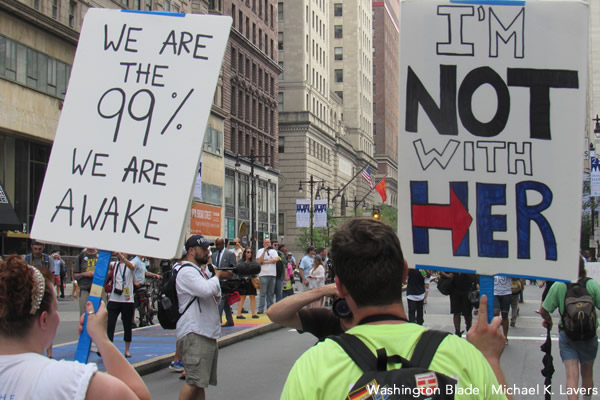 Two Bernie Sanders supporters march down Broad Street in Philadelphia on July 25, 2016. (Washington Blade photo by Michael K. Lavers)