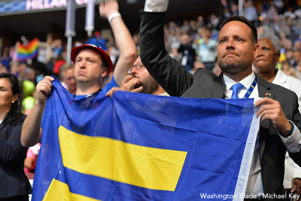 Delegates hold aloft a Human Rights Campaign flag during Sarah McBride's speech at the Democratic National Convention on July 28. (Washington Blade photo by Michael Key)