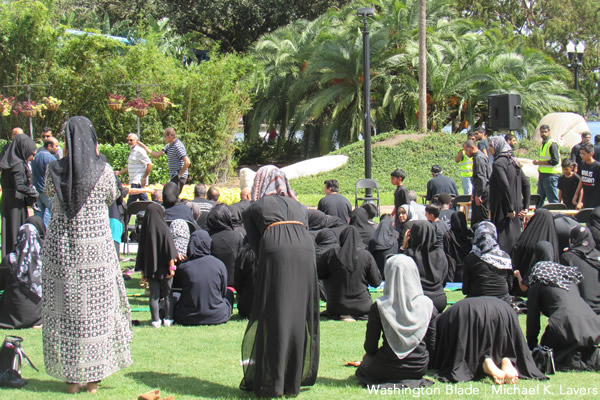 A group of Shiite Muslim women pray in Lake Eola Park in Orlando, Fla., on Oct. 9, 2016. (Washington Blade photo by Michael K. Lavers)