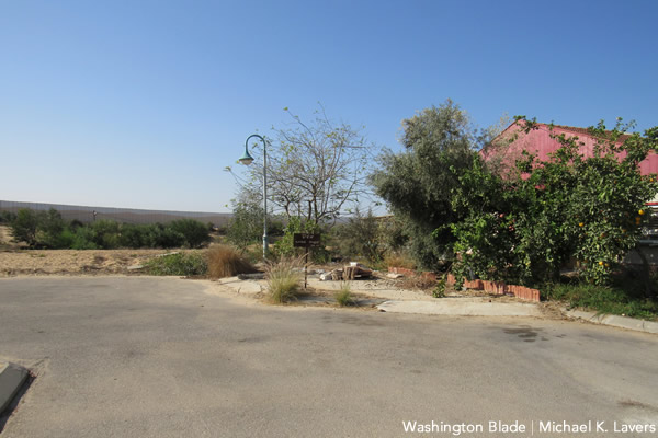 The Israeli settlement of Netiv HaAsara is a few hundred feet away from the wall that separates it from the Gaza Strip. (Washington Blade photo by Michael K. Lavers)