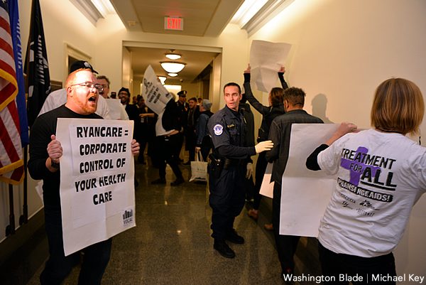 Ten activists were arrested after picketing in front of House Speaker Paul Ryan's office. (Washington Blade photo by Michael Key)