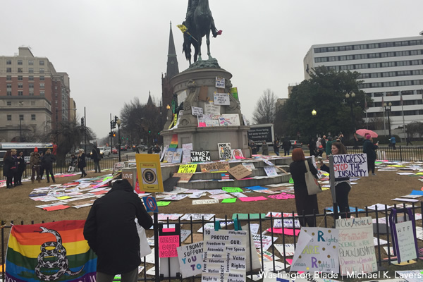 Signs from the Women's March remain in Thomas Circle in Northwest D.C. on Jan. 22, 2017. (Washington Blade photo by Michael K. Lavers)