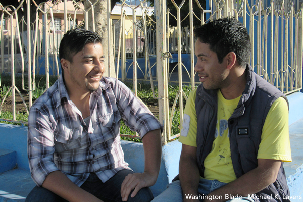 David Meneses, left, speaks with Bryan López in El Tejar, Guatemala on Feb. 2, 2017 (Washington Blade photo by Michael K. Lavers)