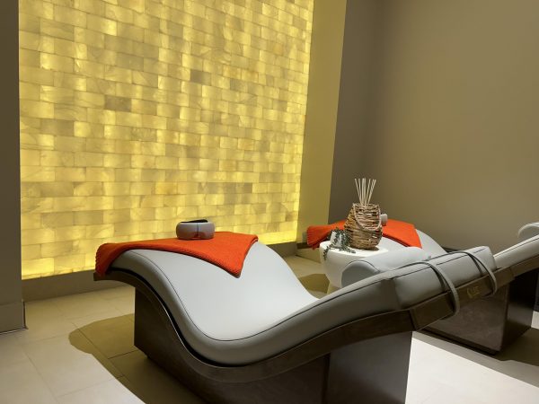 Among The Mather’s many wellness features is its spa, where residents can take breath therapy near the Himalayan sea salt wall.
